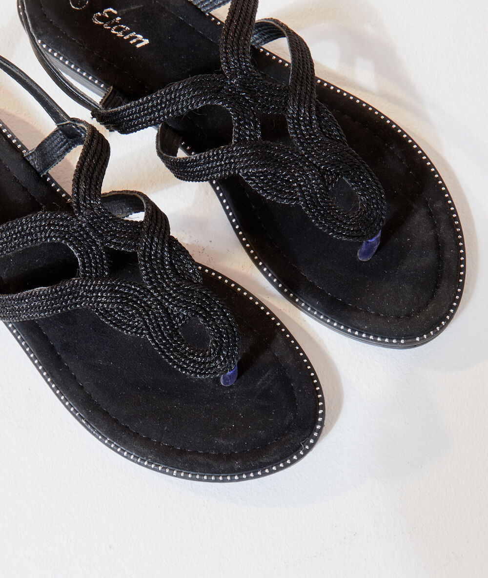 Sandalias planas tiras trenzadas negro.