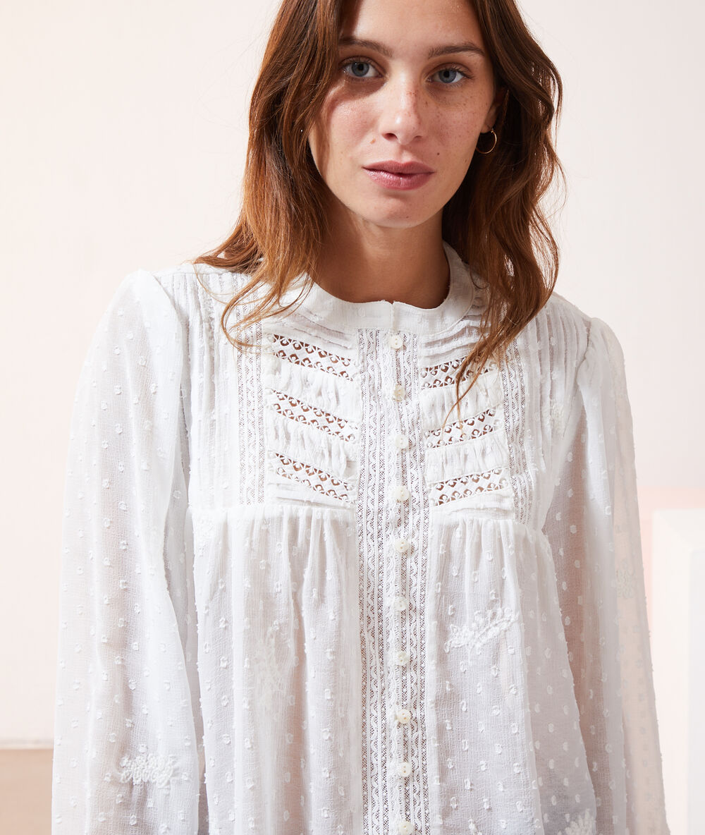 Blusa tul plumeti crudo.