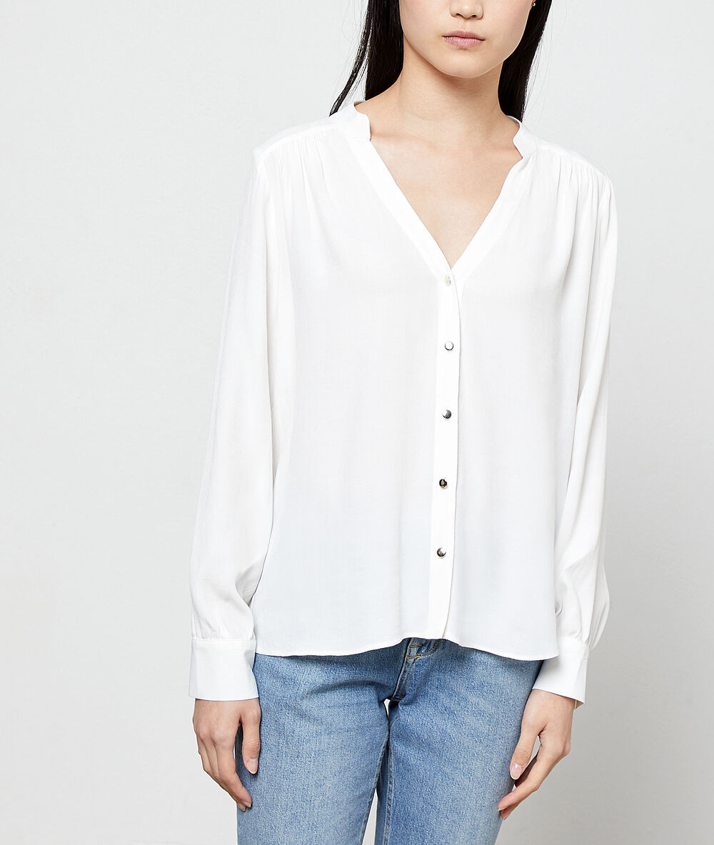 Blusa abotonada crudo.