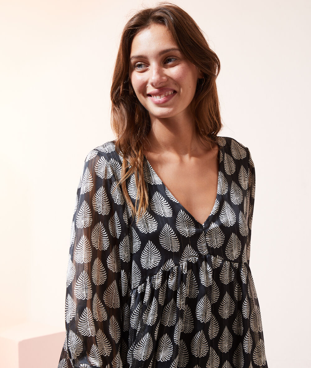 Vestido vaporoso estampado hojas negro.