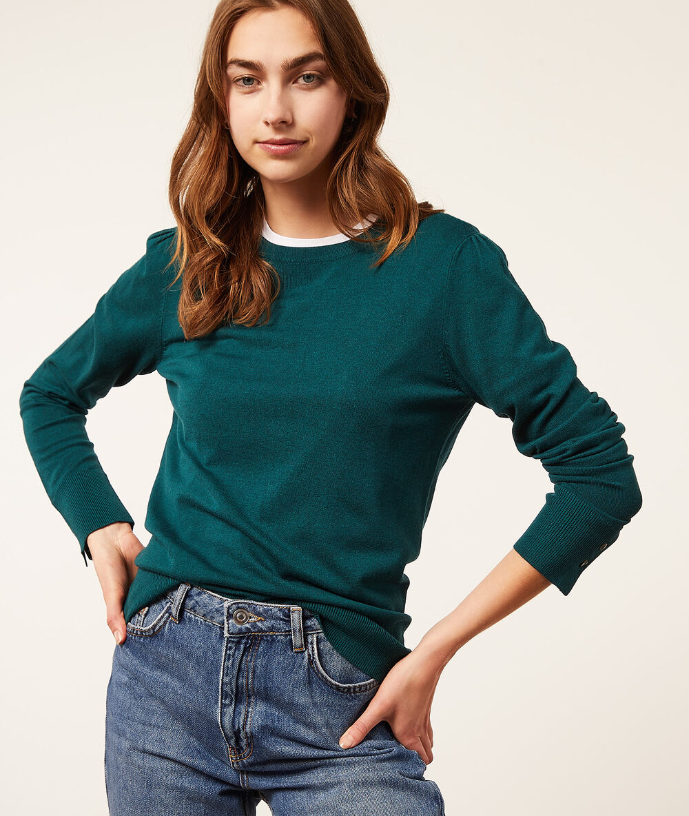 Jersey de punto fino verde.