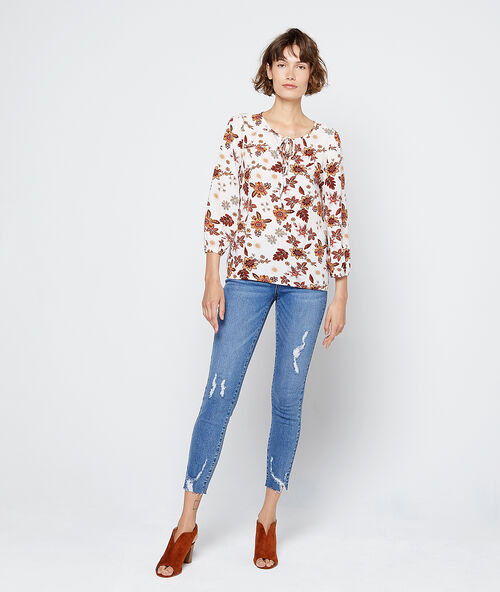 Blusa estampado floral crudo.