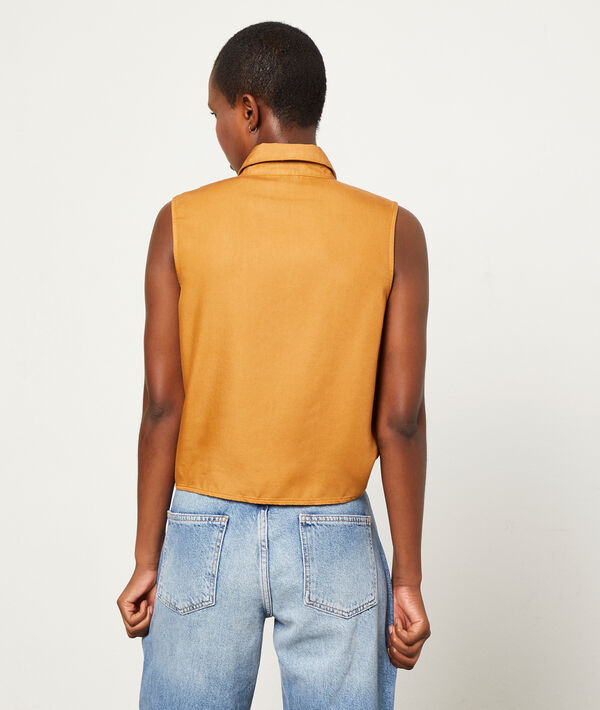 Camisa sin mangas con lazada Camisa sin mangas con lazada