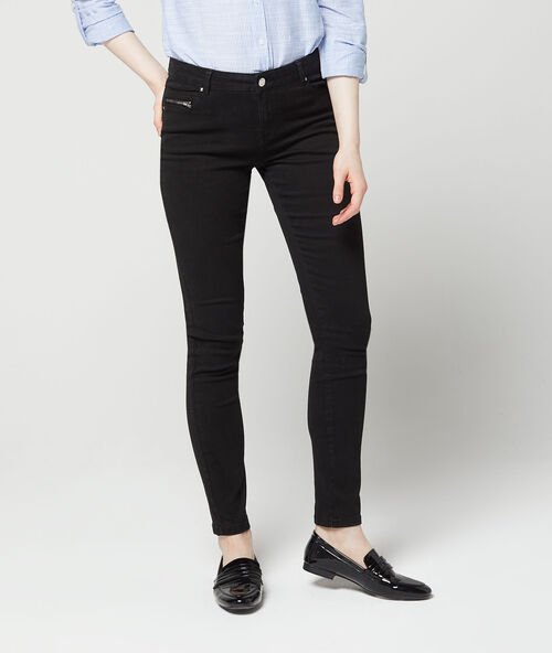 Pantalón ajustado 100% en algodón negro.