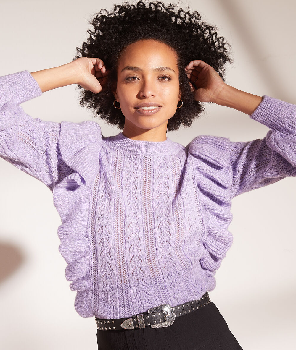 Jersey de punto con volantes lila.