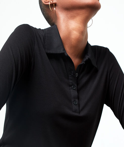 Polo de manga 3/4 de algodón negro.
