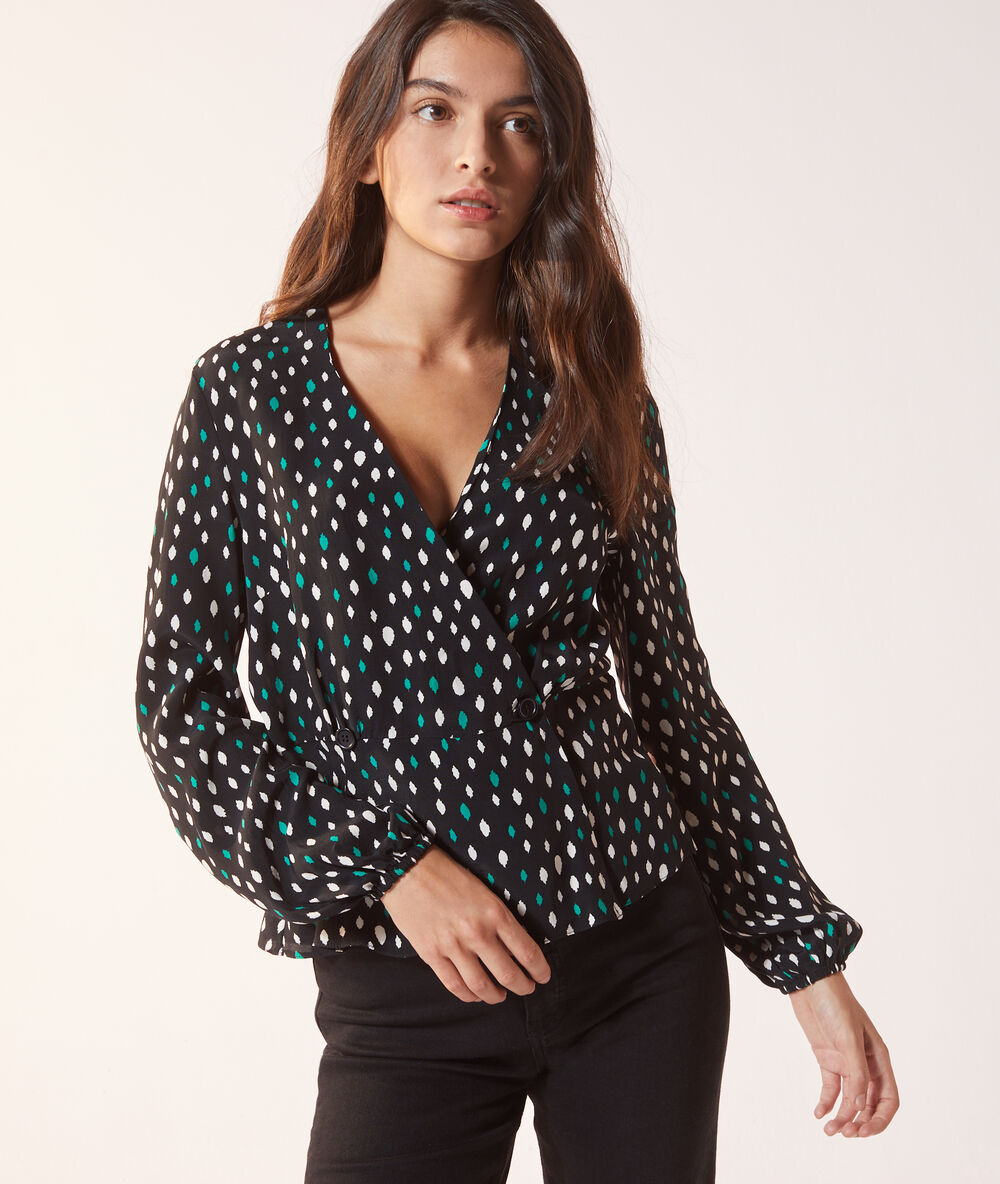 Blouse cache-cœur noir.