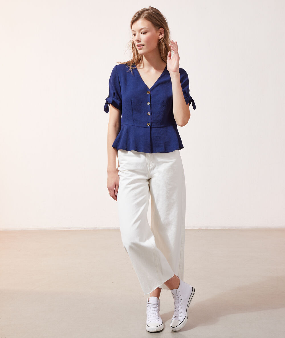 Blusa detalle lazos azul marino.
