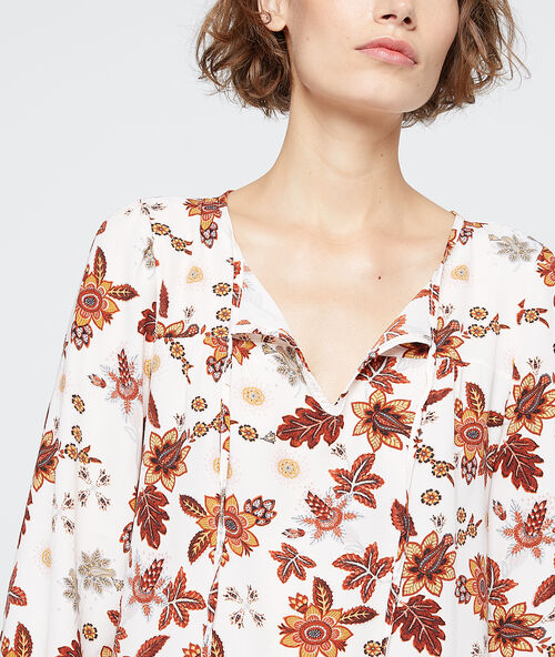 Blusa estampado floral crudo.