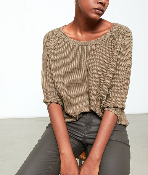 Pull en grosse maille kaki.