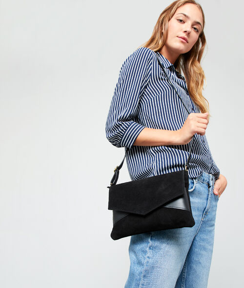 Bolso efecto ante negro.