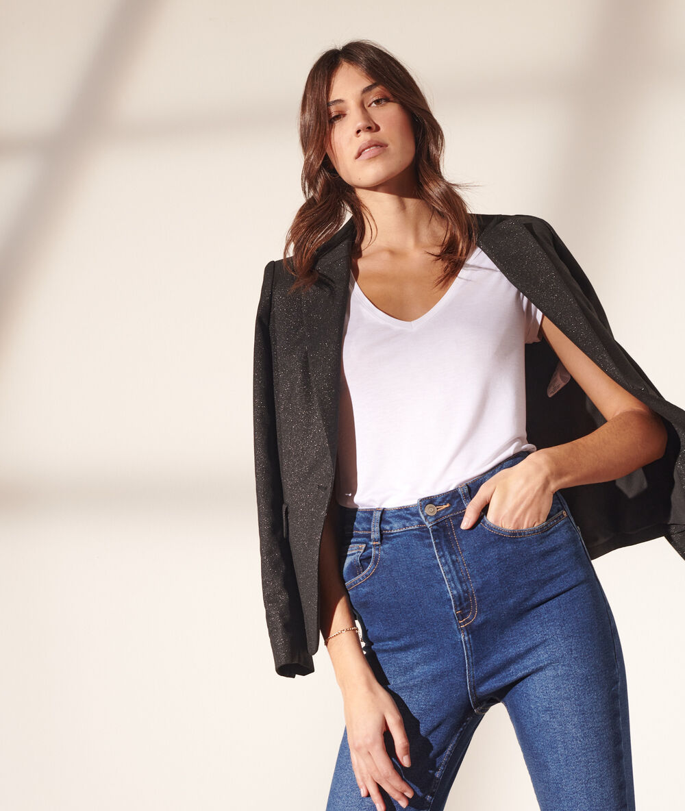 Americana con lentejuelas negro.