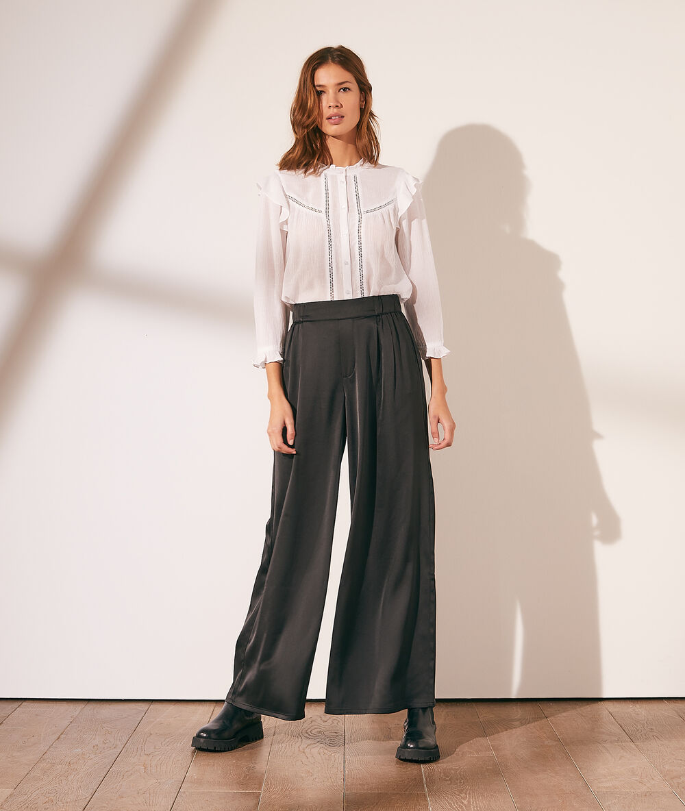 Camisa con volantes crudo.