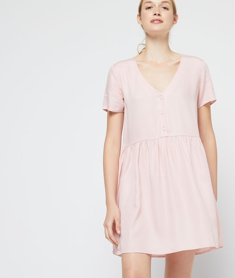 Vestido acampanado de tencel rosa pálido.