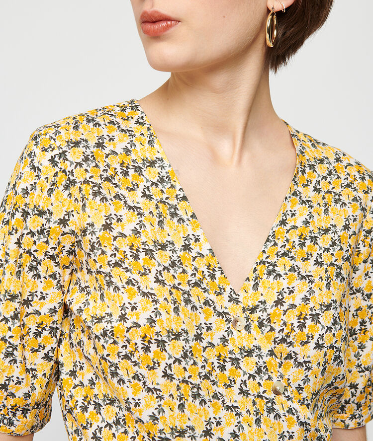 Blusa escote cruzado crudo.