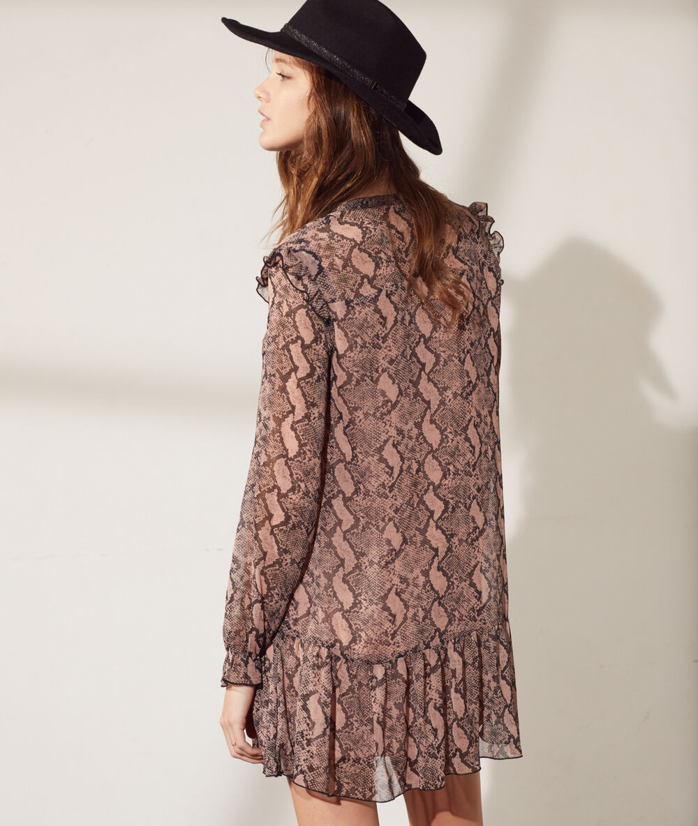 Vestido corto estampado maquillaje.