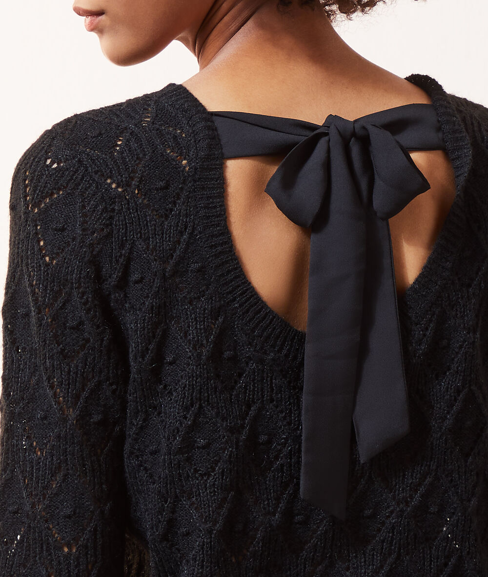 Pull maille pointelle noué au dos noir.
