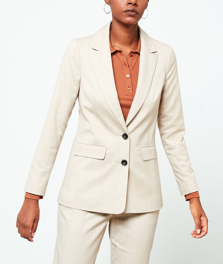 Chaqueta de sastre crema.