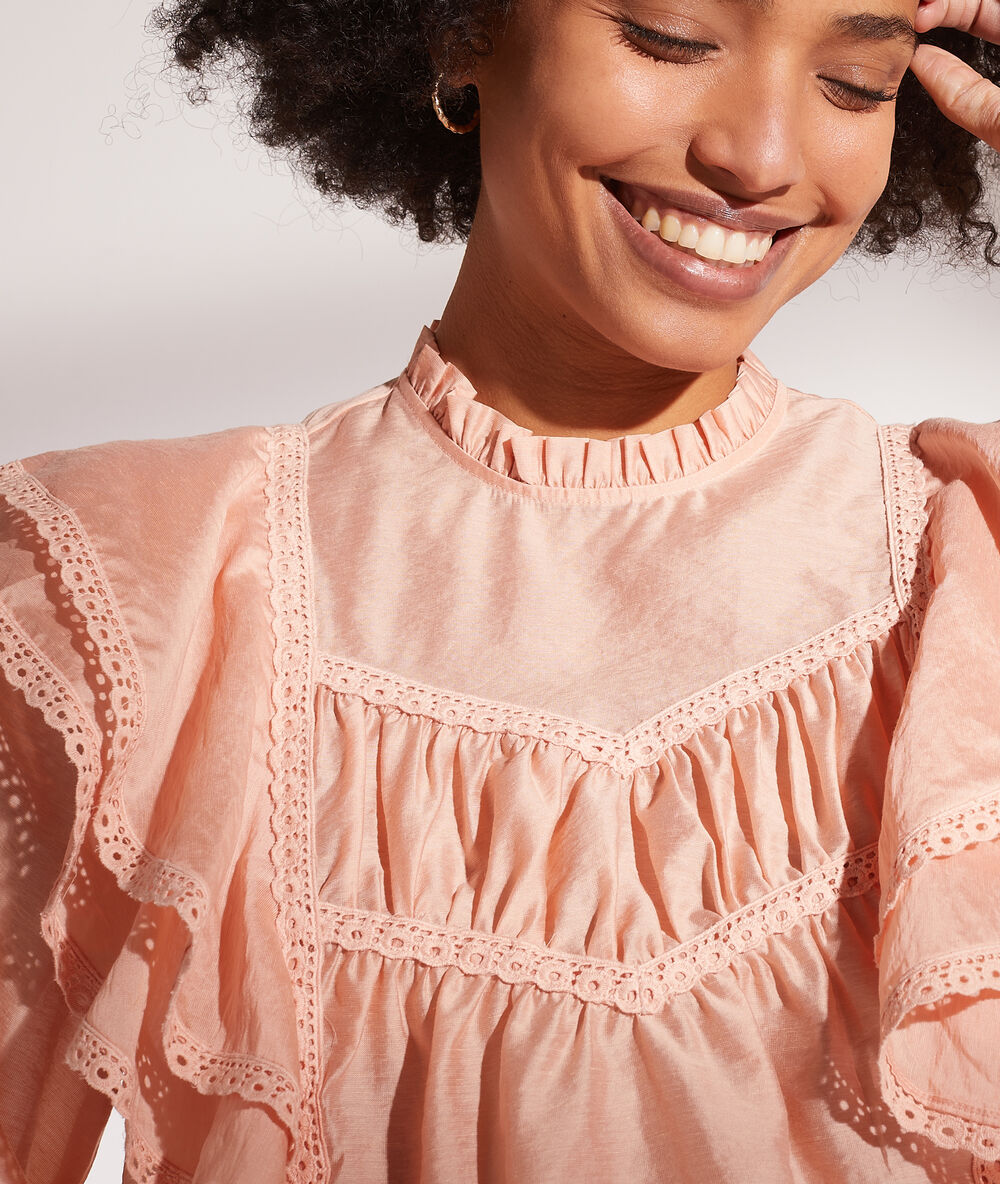 Blusa con volantes melocotón.
