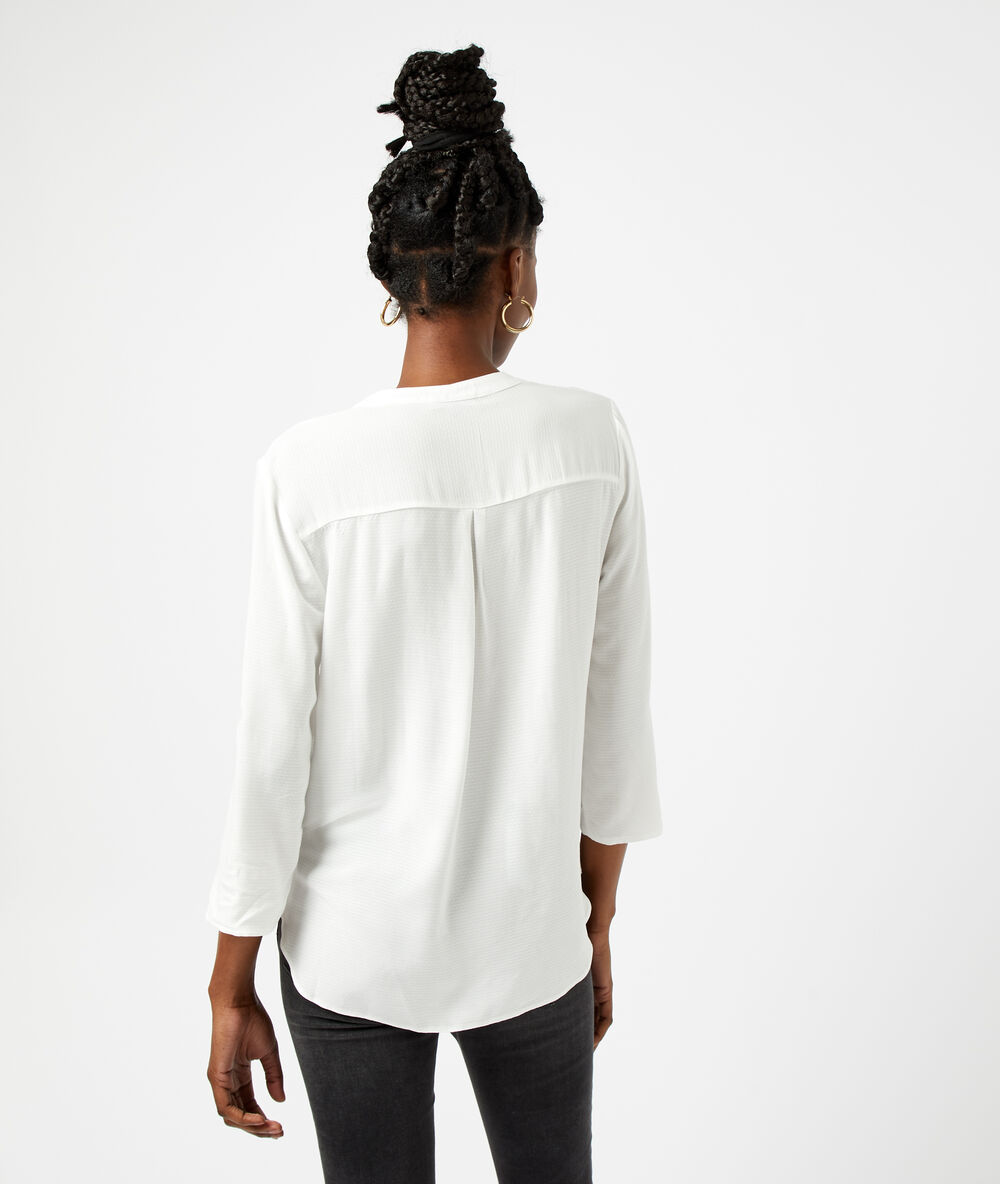 Blusa lisa crudo.