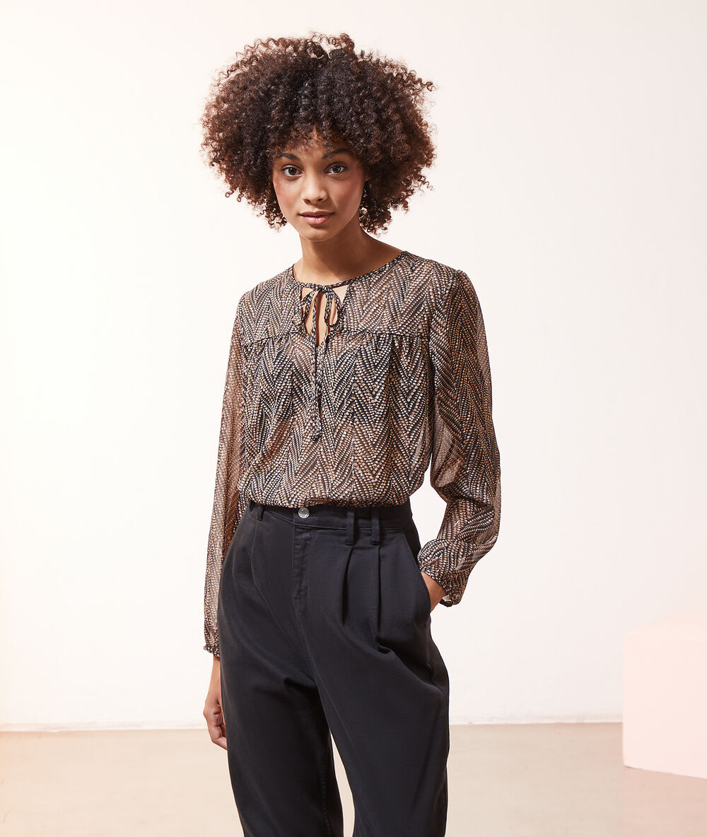 Blouse imprimé géométrique noir.