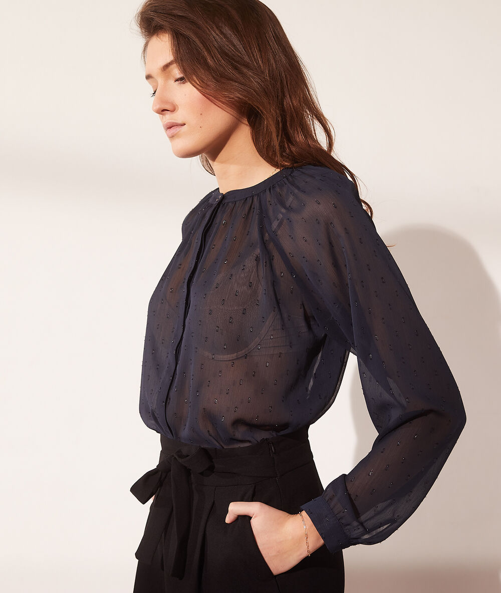 Blusa tul plumetis azul marino.