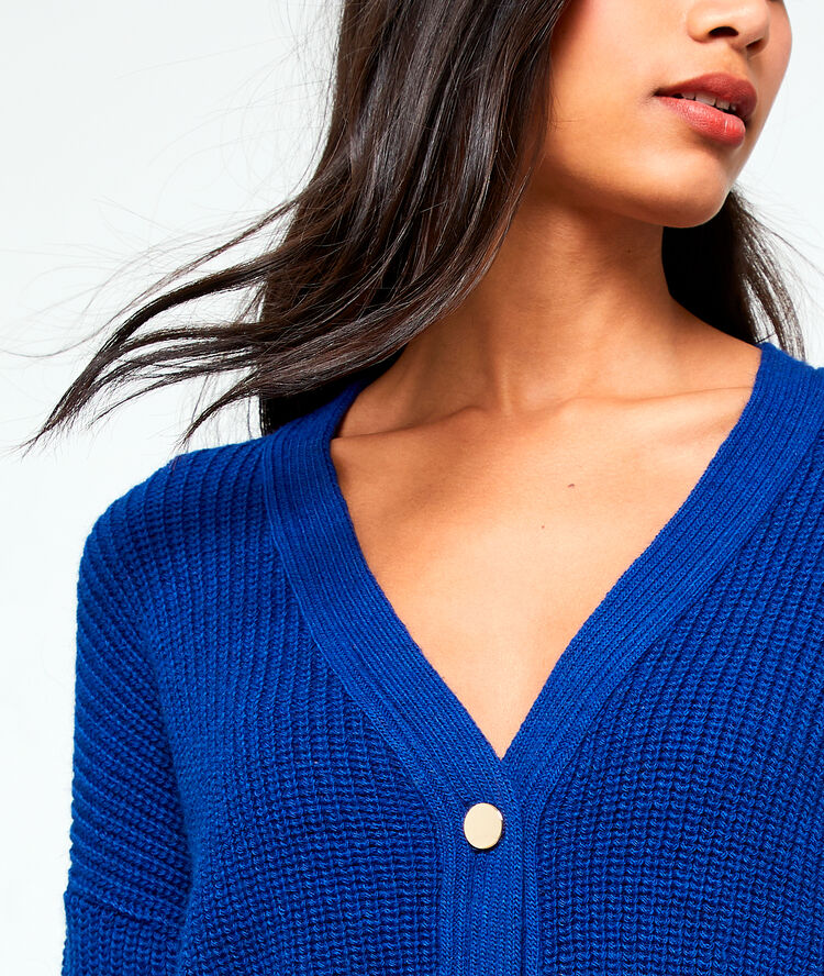 Rebeca de punto grueso azul.