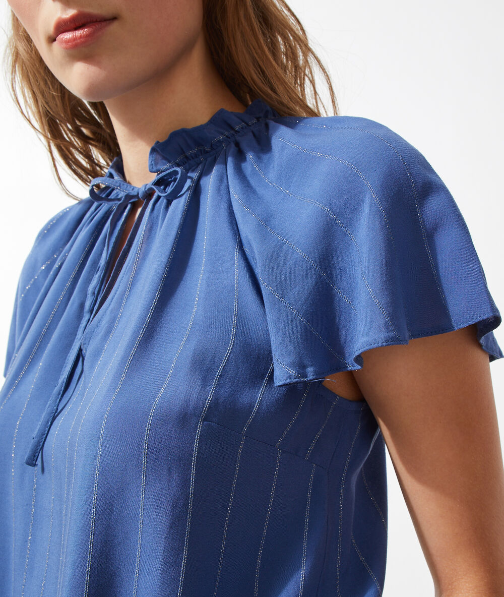 Blusa vaporosa, estampado de rayas azul.