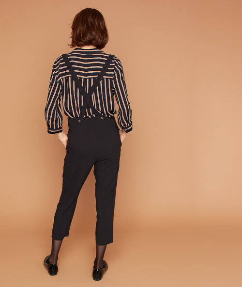 Pantalón de talle alto con tirantes negro.