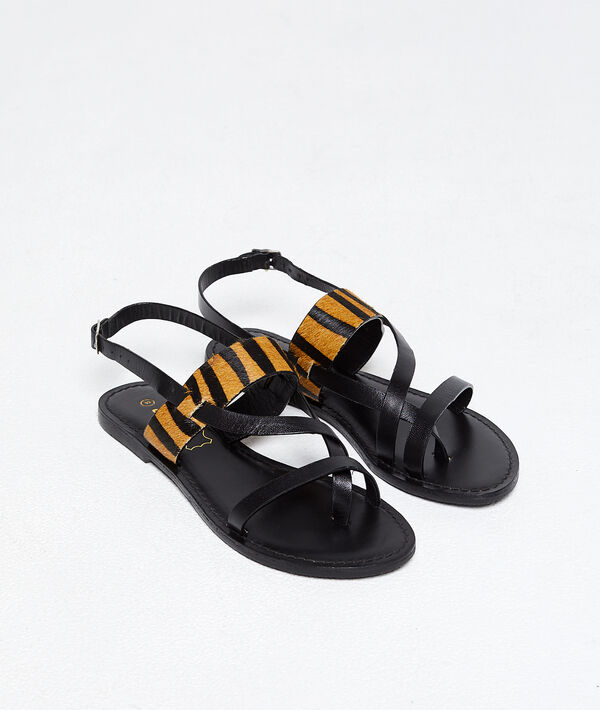 Sandalias planas con animal print Sandalias planas con animal print