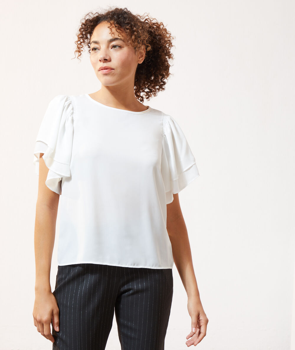 Blusa con volantes crudo.
