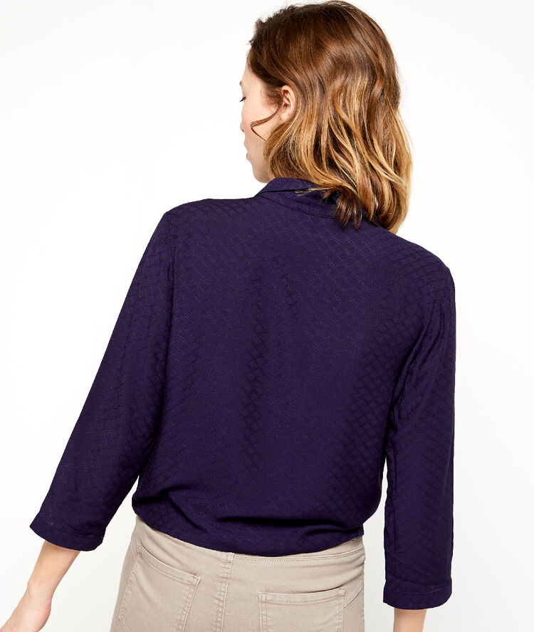 Camisa anudada con estampado jacquard azul marino.