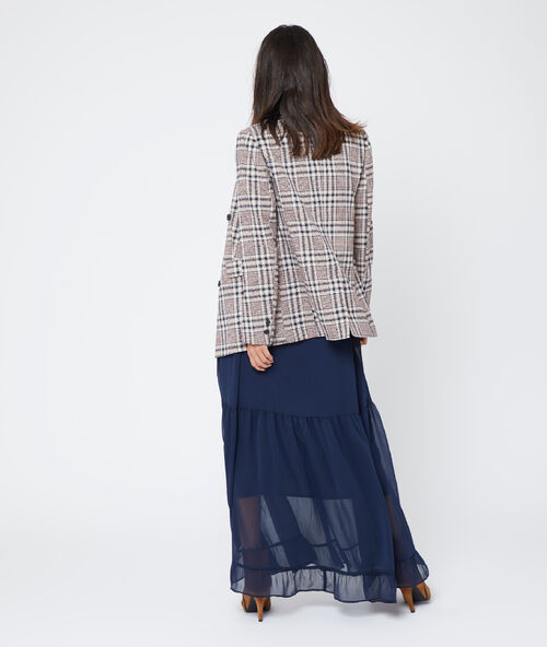 Chaqueta de cuadros crema.