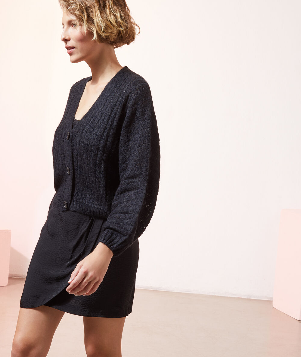 Gilet ample noir.