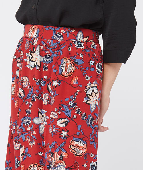 Falda larga estampado floral tomate.
