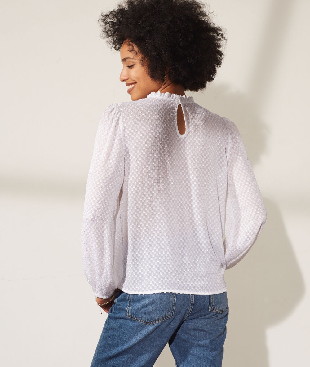 Blusa tul plumeti crudo.