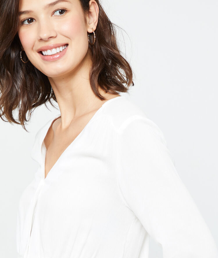 Blusa abotonada crudo.