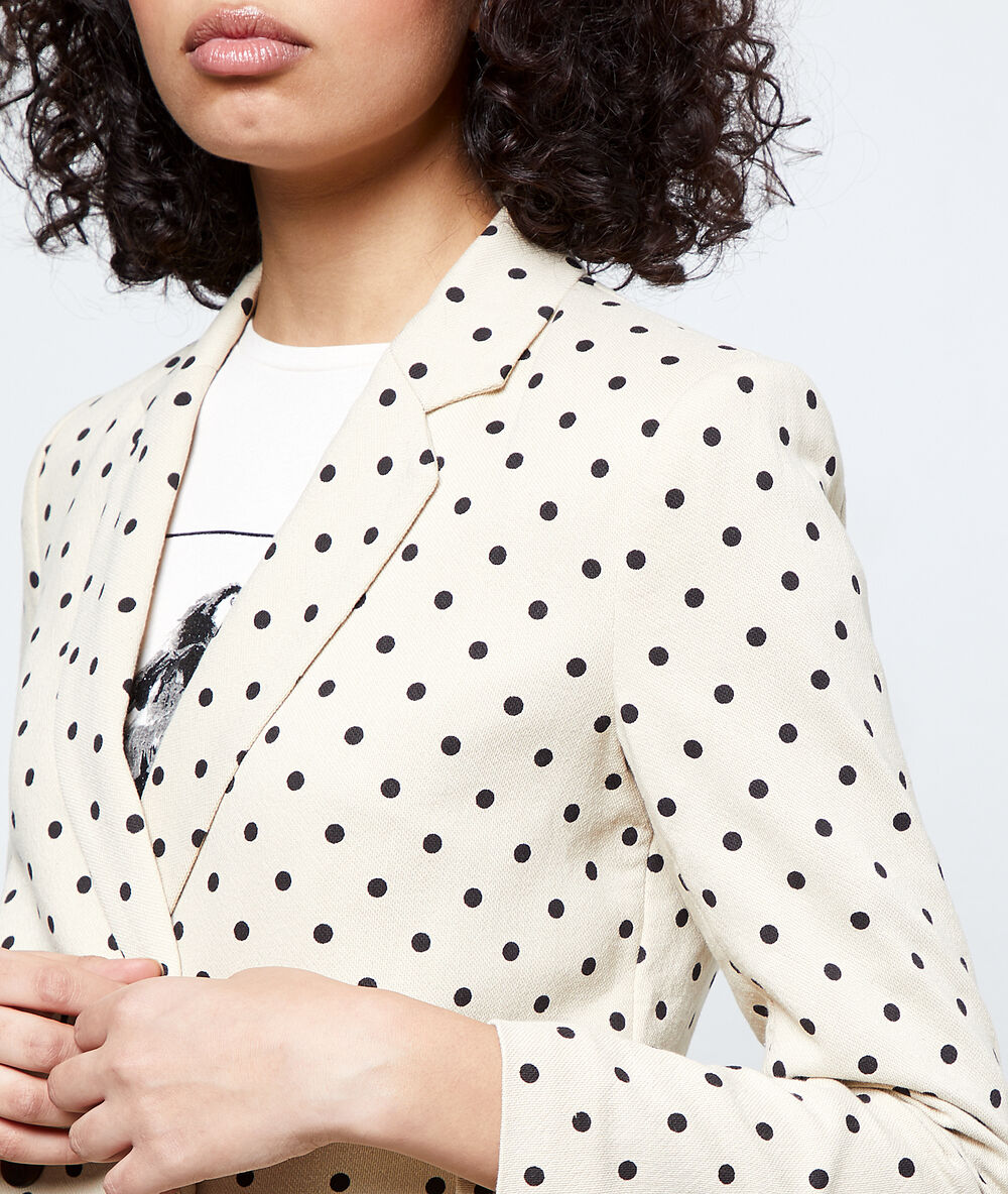 Chaqueta de sastre de lunares crudo.