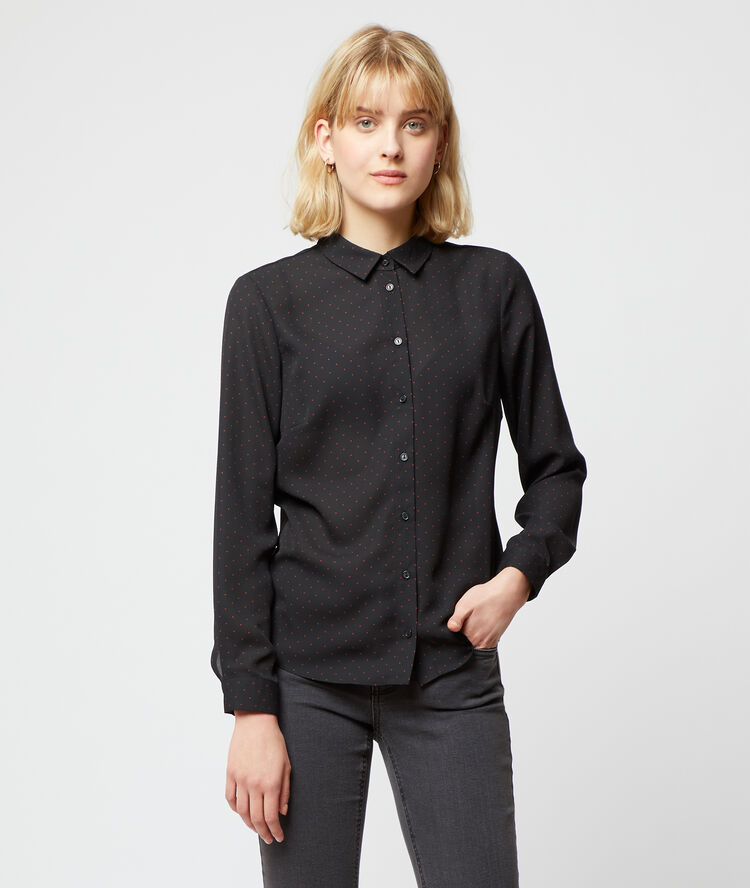 Camisa de lunares negro.