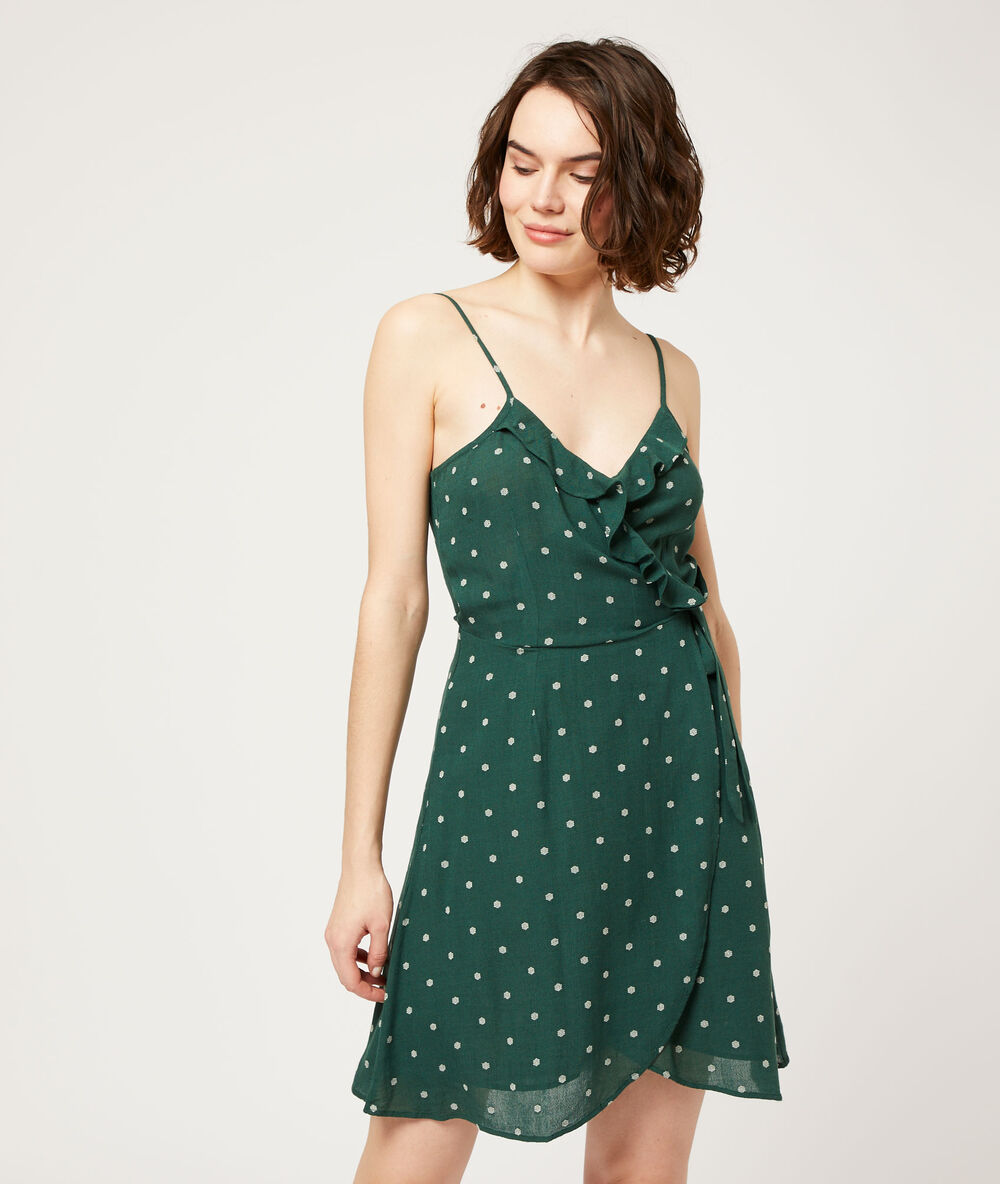 Vestido escote cruzado, estampado de lunares turquesa.