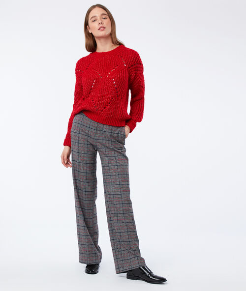 Pantalón estampado de cuadros negro.