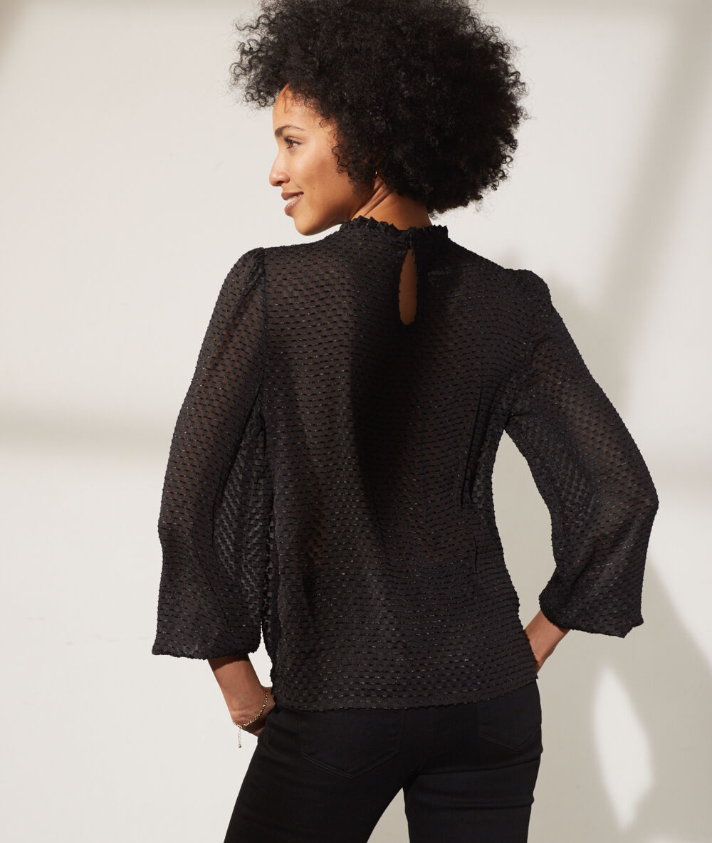 Blusa tul plumeti negro.