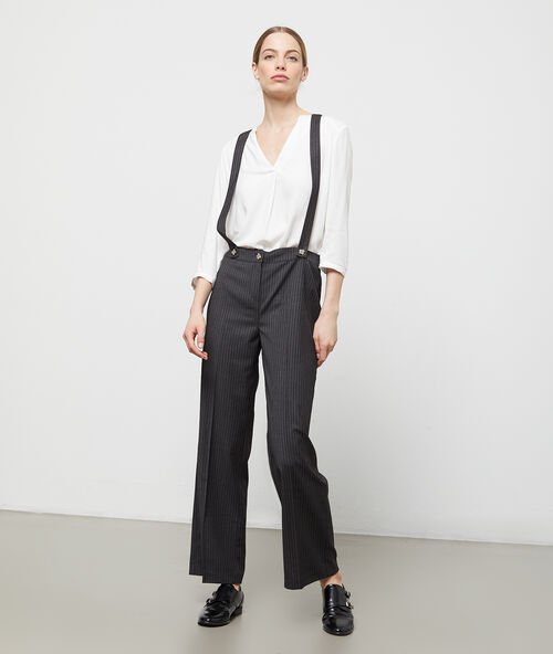 Pantalón ancho con tirantes topo.
