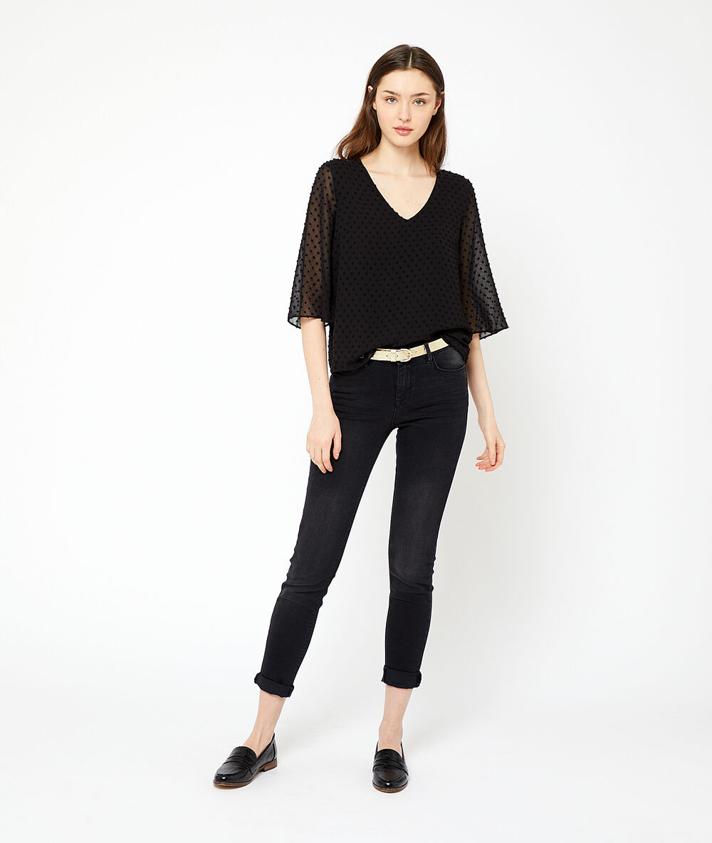 Blouse en plumetis noir.