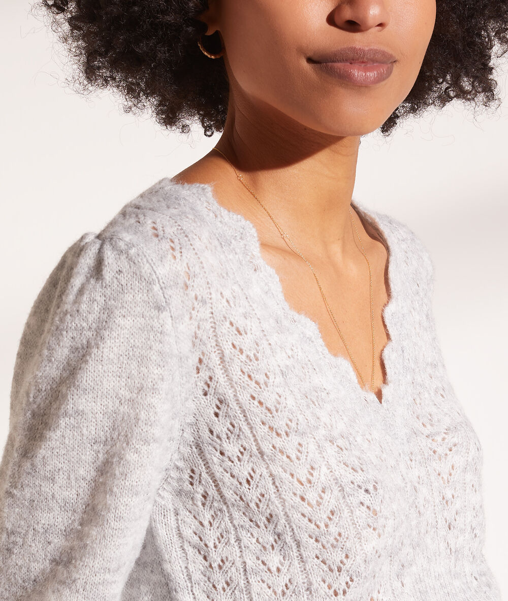 Jersey de punto escote en v c.gris jaspeado.