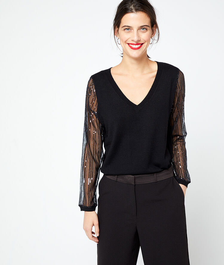 Suéter con lentejuelas y manga transparente negro.