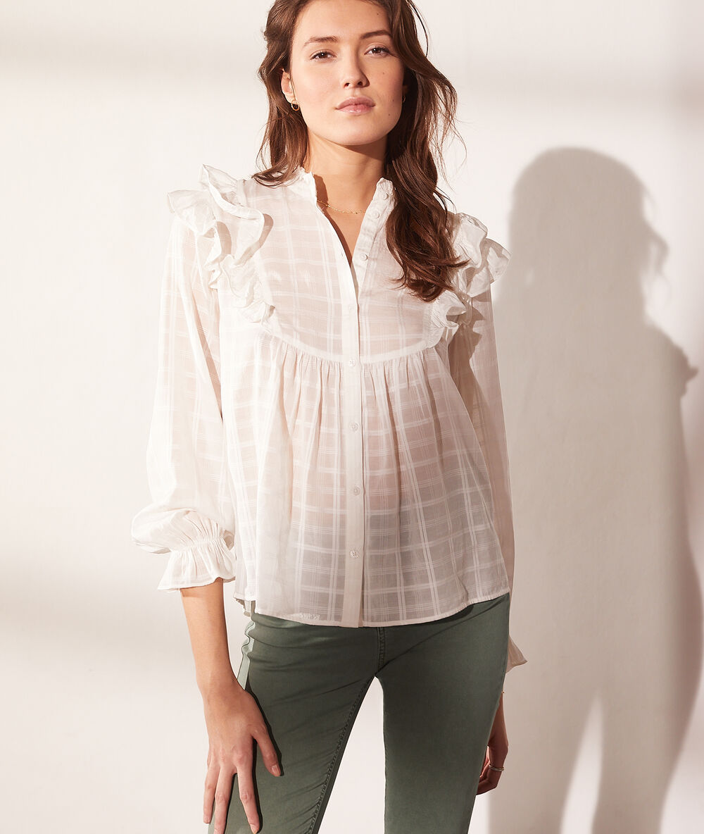Blusa con volantes crudo.