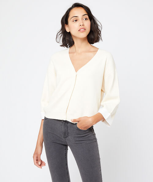 Rebeca de punto fino crudo.