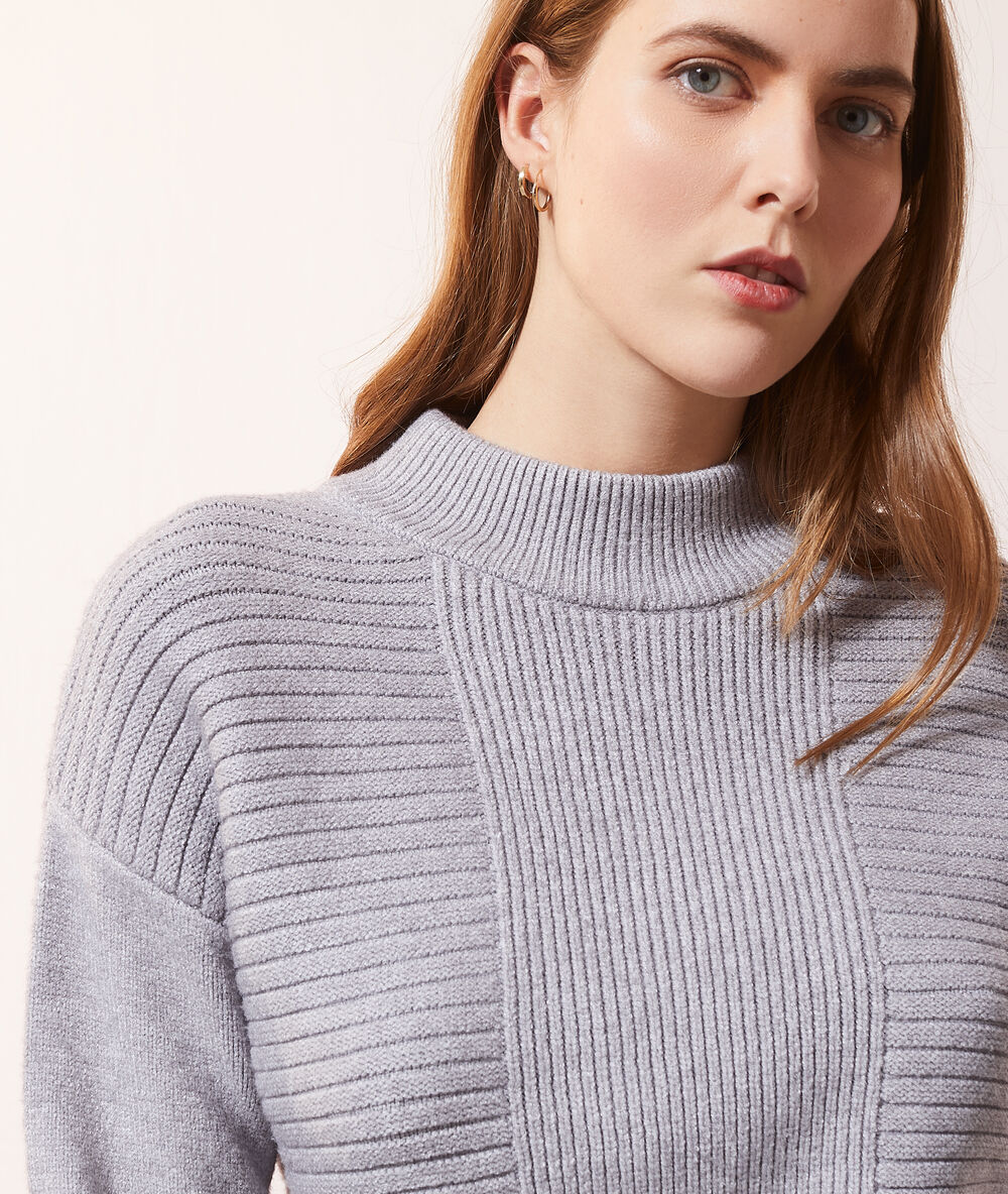Jersey de cuello alto c.gris jaspeado claro.