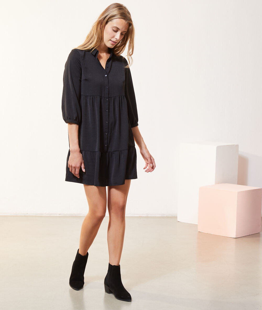 Vestido vaporoso negro.